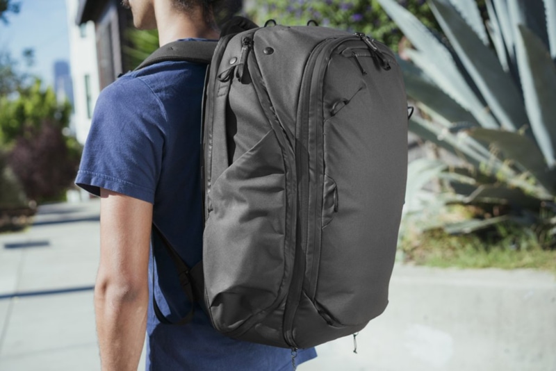 a man carrying a Peak Design bag
